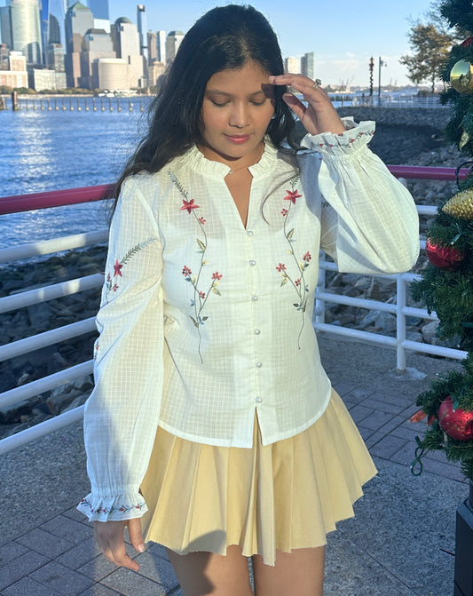 Close up front picture of White Floral embroidered long sleeve top