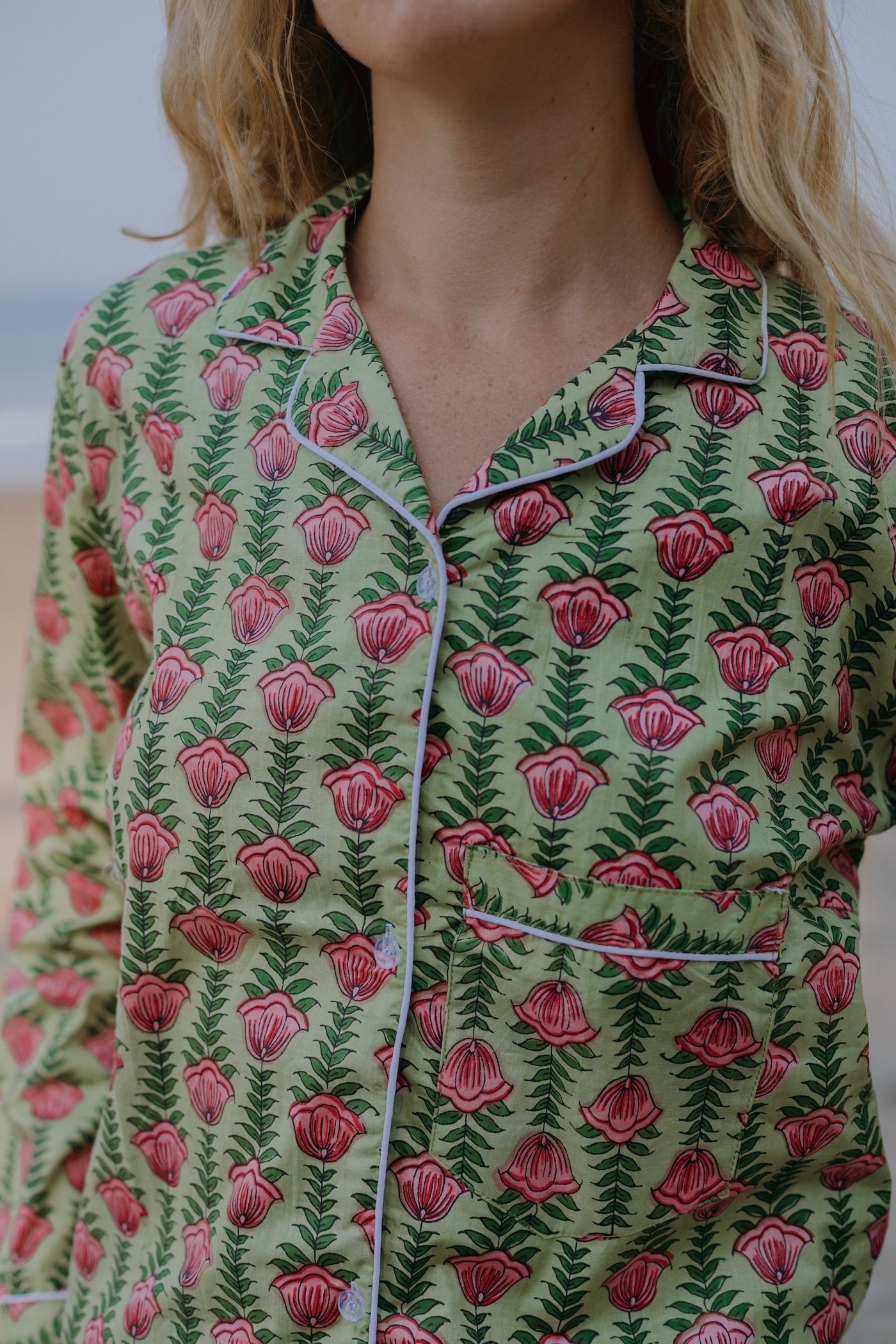 Close-up picture of green floral pajama set