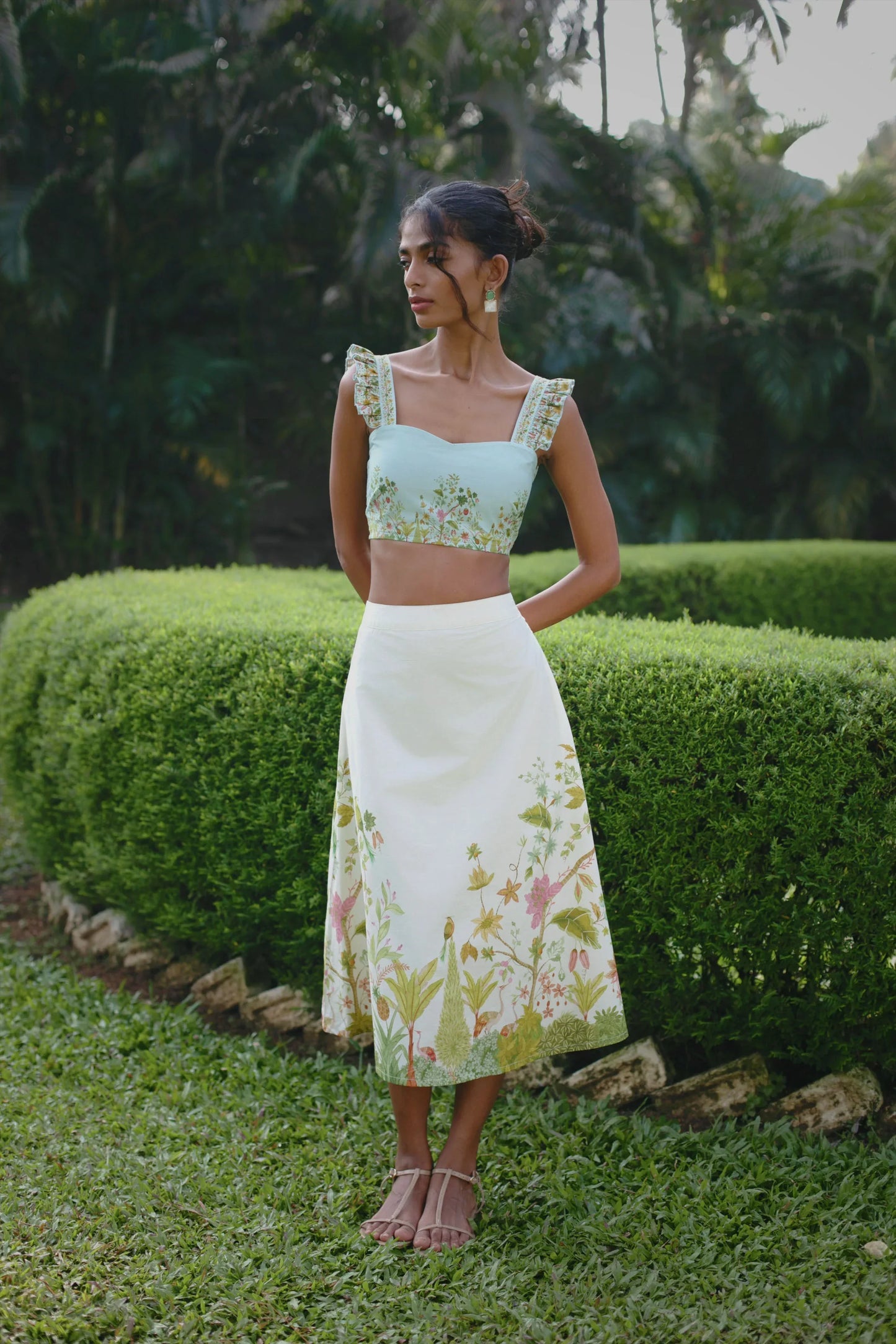 Off-white Chintz floral midi skirt styled with blue floral bralet crop top — Amaya World slow fashion