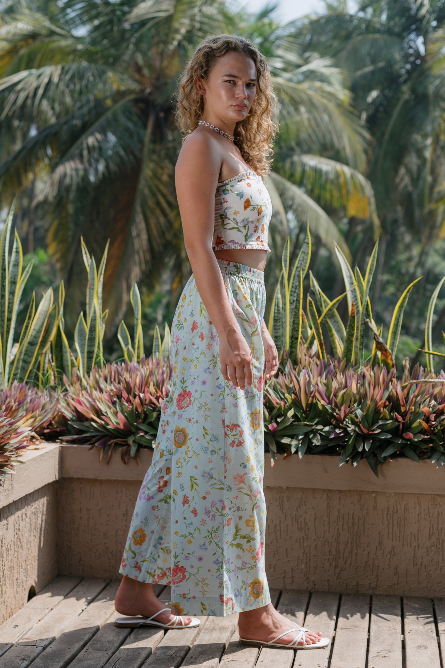 Side picture of white strapless crop