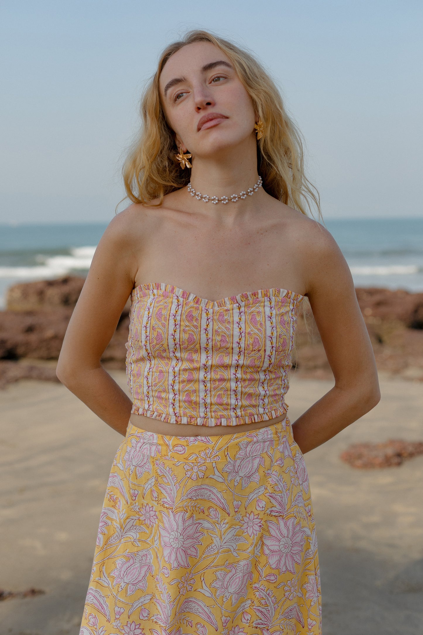 from close up yellow crop top and skirt set