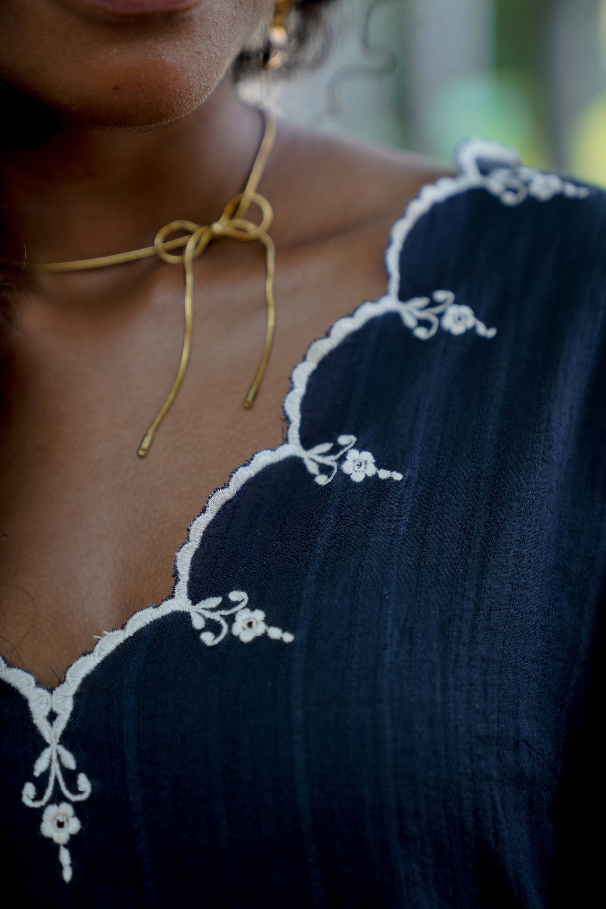 Detail picture of black embroidered top with full sleeves