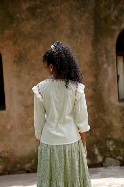 Back picture of white embrodiered button down top