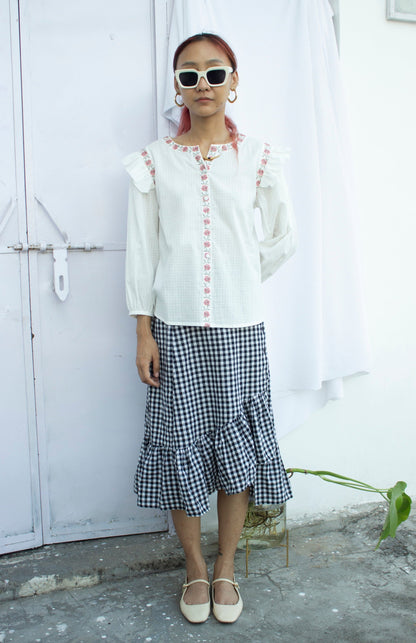 Full front picture of white embrodiered button down top