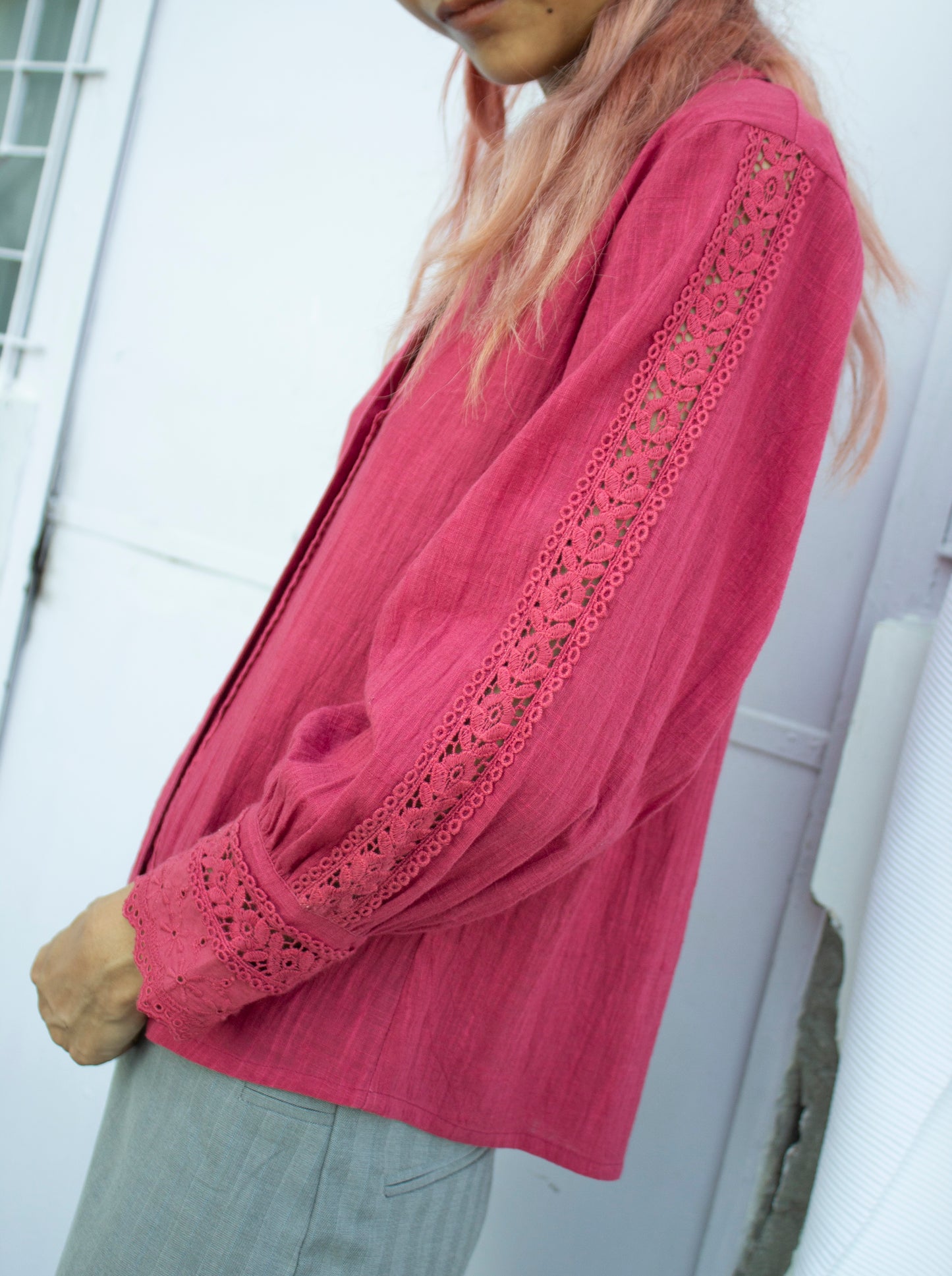 Side picture of long sleeve cropped shirt with lace detail