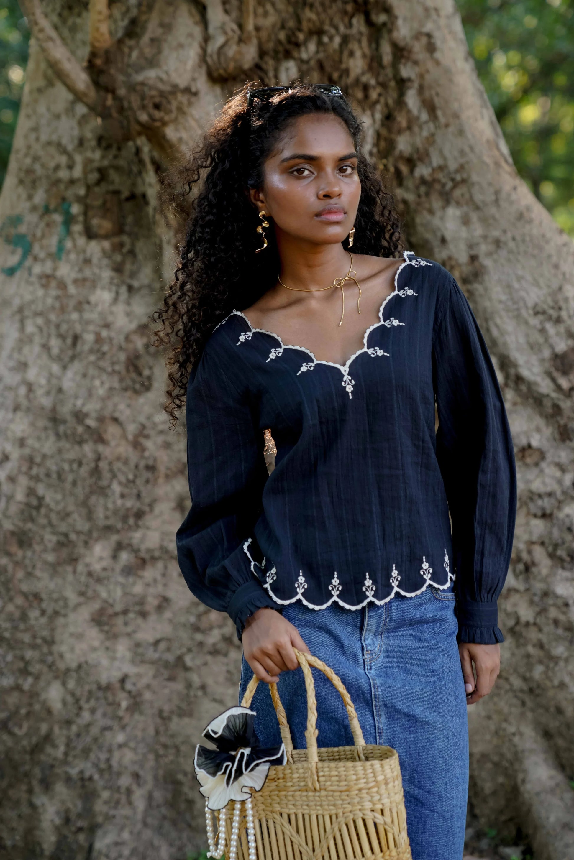 Front picture of black embroidered top with full sleeves
