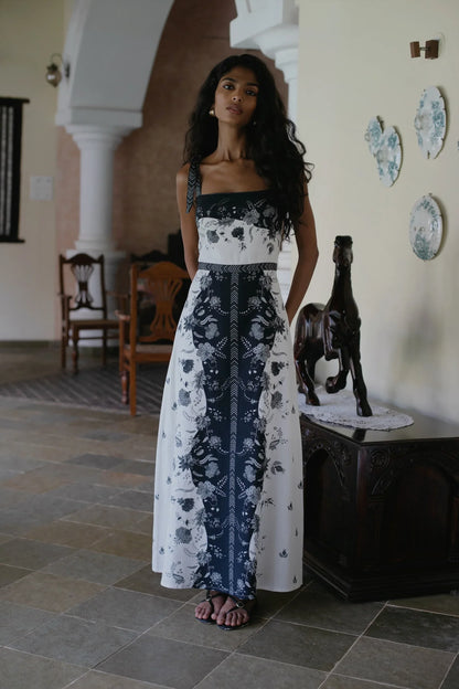 Full front view of Black white floral cotton linen maxi dress styled for a wedding or graduation or party — Amaya World