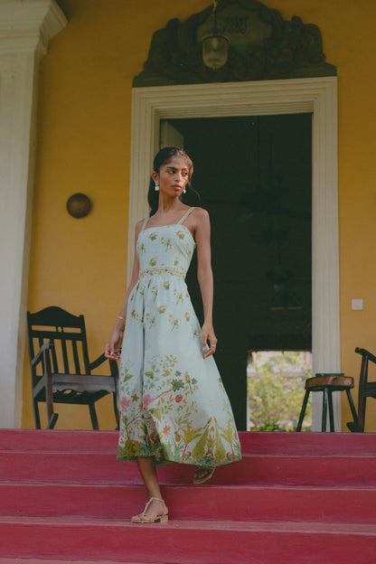 styled image of floral botanical print cotton fit-and-flare midi dress in blue, perfect wedding guest dress— Amaya World
