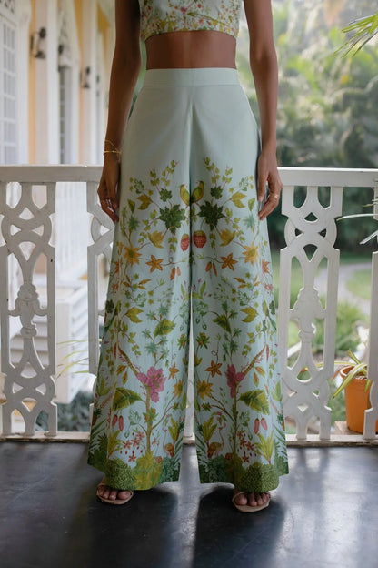 Close-up of Blue Floral Chintz inspired botanical print high-waisted wide-leg cotton trousers — Amaya World handmade slow fashion