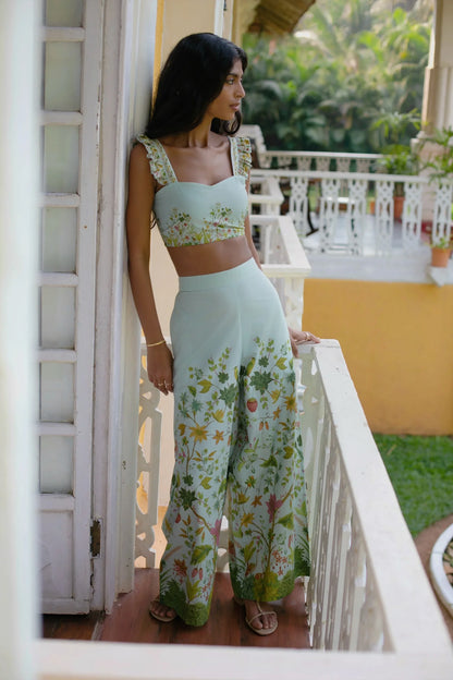 Side picture of Blue Floral Chintz inspired botanical print high-waisted wide-leg cotton trousers — Amaya World handmade slow fashion