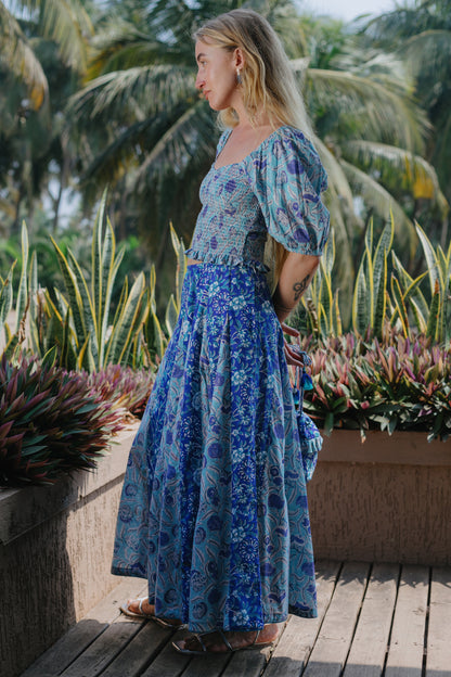 Side picture of blue godet skirt