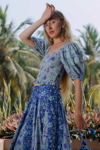 Close up picture of blue godet skirt