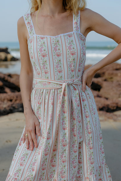 Close up picture of white floral sleeveless boho dress