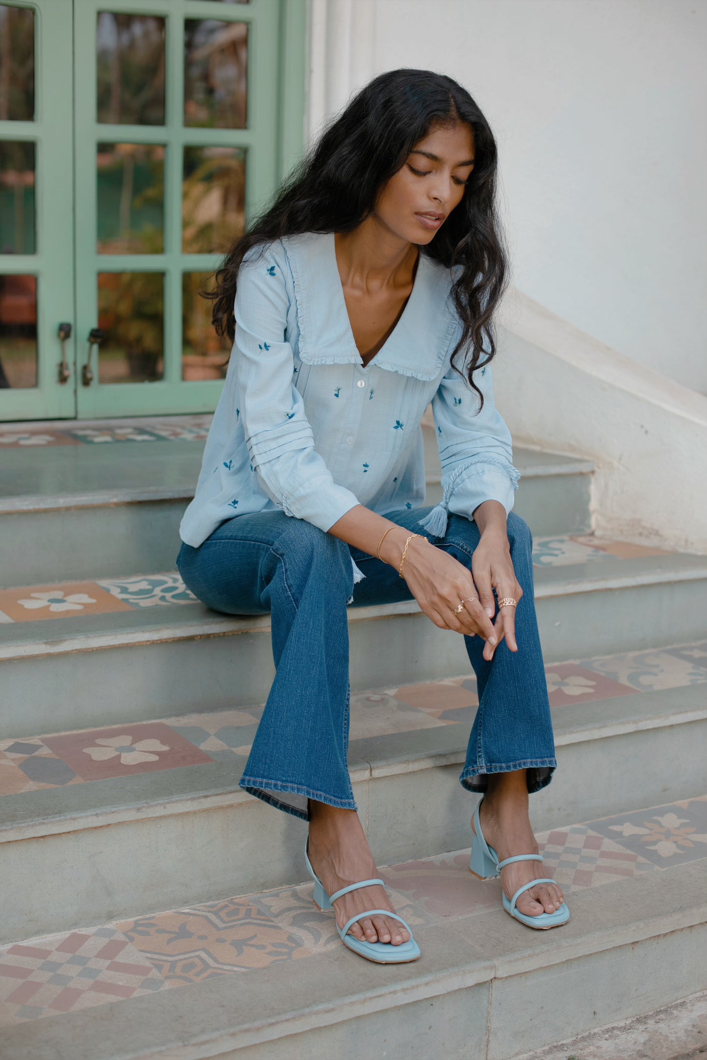 Hand-embroidered miniature tulips on sky blue cotton linen boho blouse, 3/4 sleeves — Amaya World artisan top 
