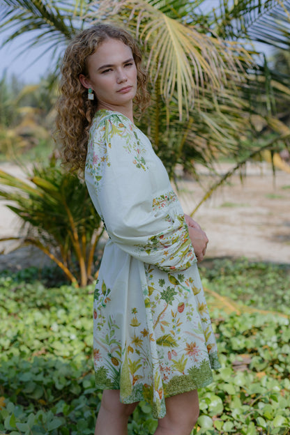 Side picture of mini dress with full sleeves