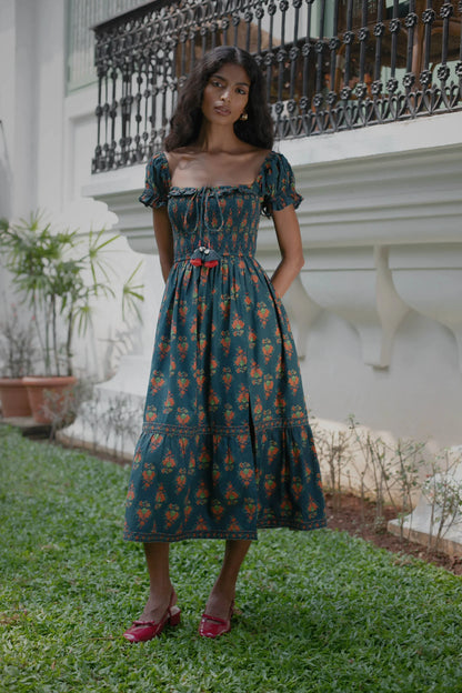 Navy Chintz floral cotton midi dress with puff sleeves styled for a wedding, holiday or occasion — Amaya World slow fashion