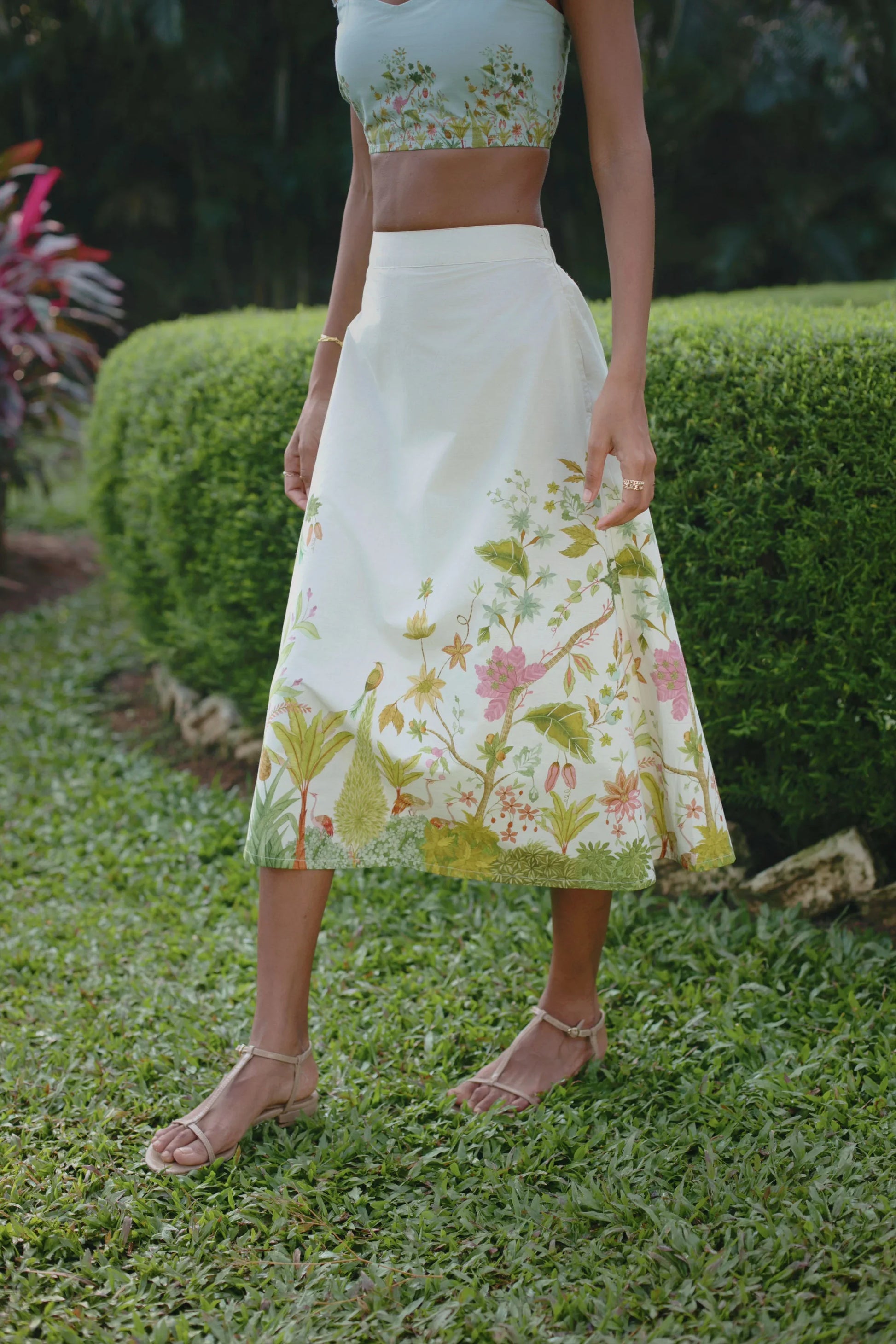 Close-up side view of off-white floral botanical print high-waist A-line cotton midi skirt — Amaya World