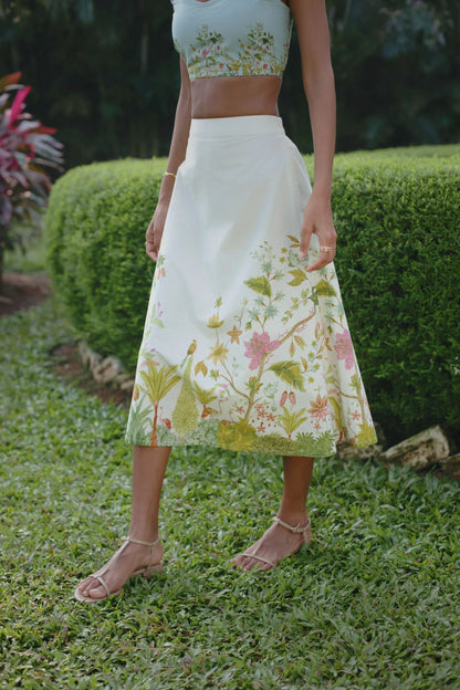 Close-up side view of off-white floral botanical print high-waist A-line cotton midi skirt — Amaya World