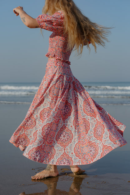 Side picture of orange crop top