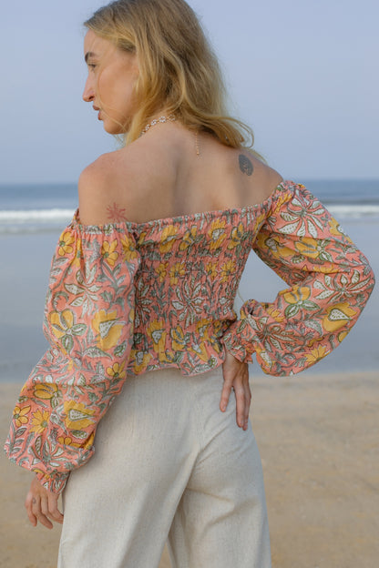 Back image of orange floral crop top