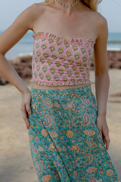 Close-up picture of pink 2 piece crop top and skirt set