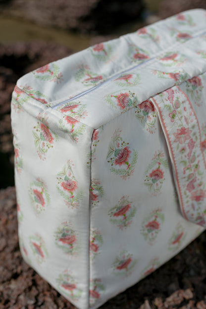 Top angle image of pink buta tote bag with model