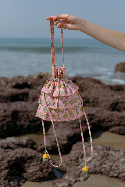 Front picture of pink frill bag with yellow flowers