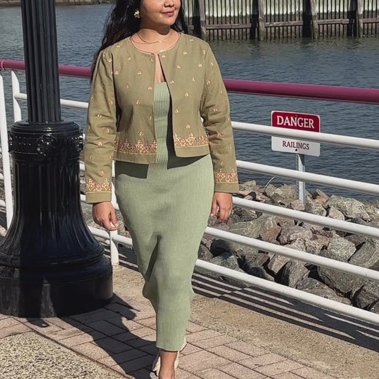Video of sage green embroidered jacket