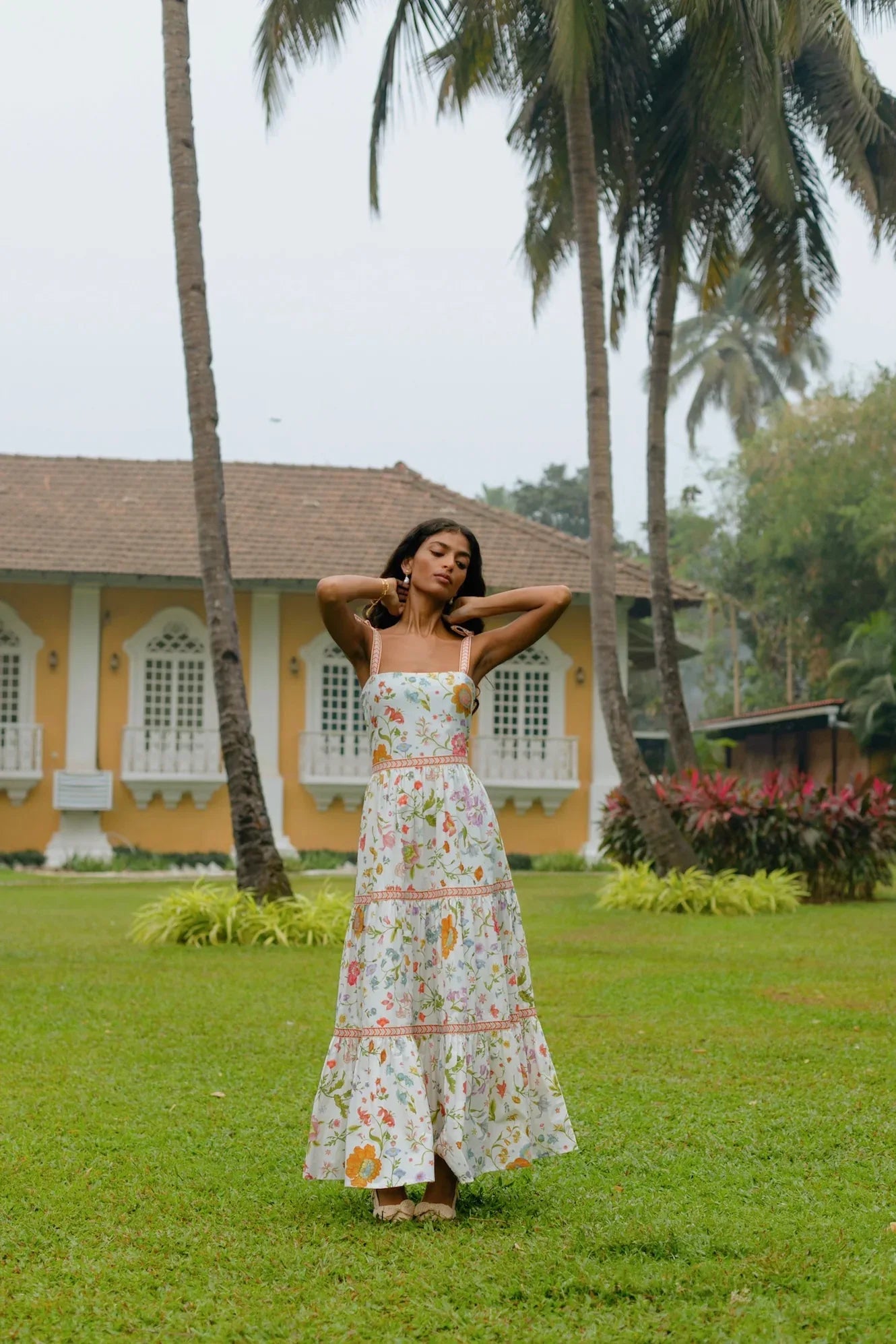 White floral tiered cotton maxi sundress with tie-up straps and A-line silhouette showing length and styling — Amaya World