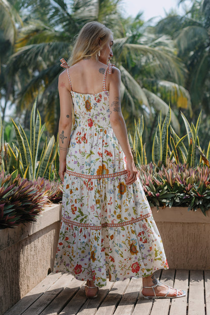 Back photo of white floral maxi dress