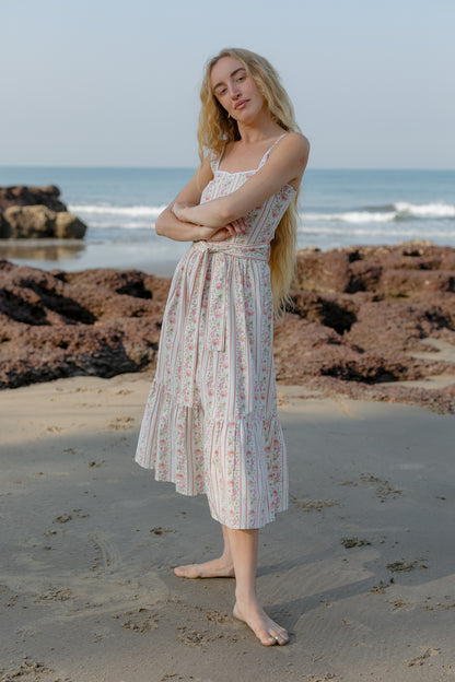 Side picture of white floral sleeveless boho dress