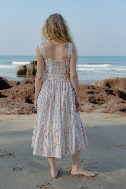 Back picture of white floral sleeveless boho dress