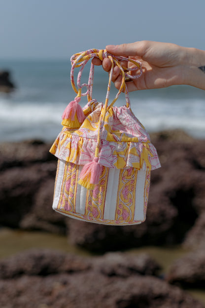 front picture of yellow bucket bag